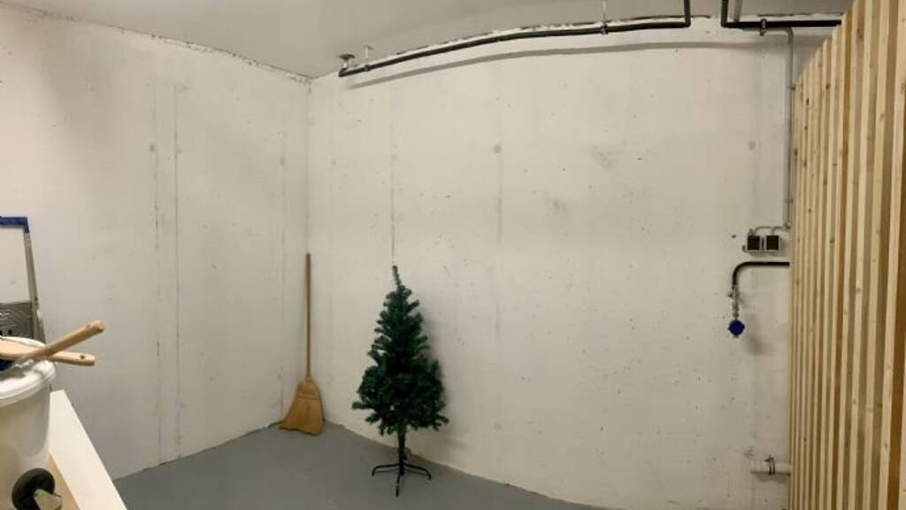 Modern 2.5-Room Loft with Balcony, E-Mobility Parking & Scenic Views