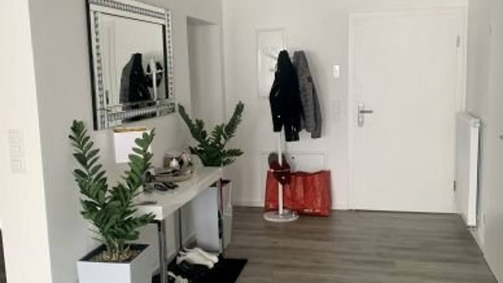 Modern 2.5-Room Loft with Balcony, E-Mobility Parking & Scenic Views