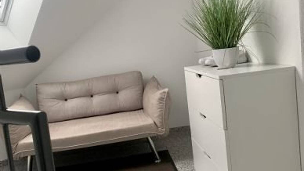 Modern 2.5-Room Loft with Balcony, E-Mobility Parking & Scenic Views