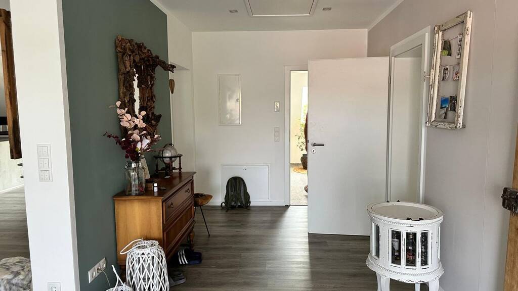 Modern 2.5-Room Loft with Balcony, E-Mobility Parking & Scenic Views